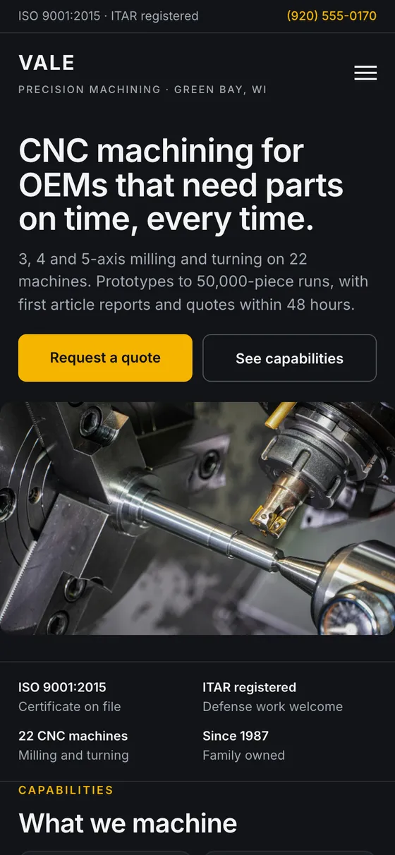 The redesigned Vale home page on a phone, dark with an amber accent, a headline about on-time CNC parts, quote and capabilities buttons, a trust strip and a capabilities grid.